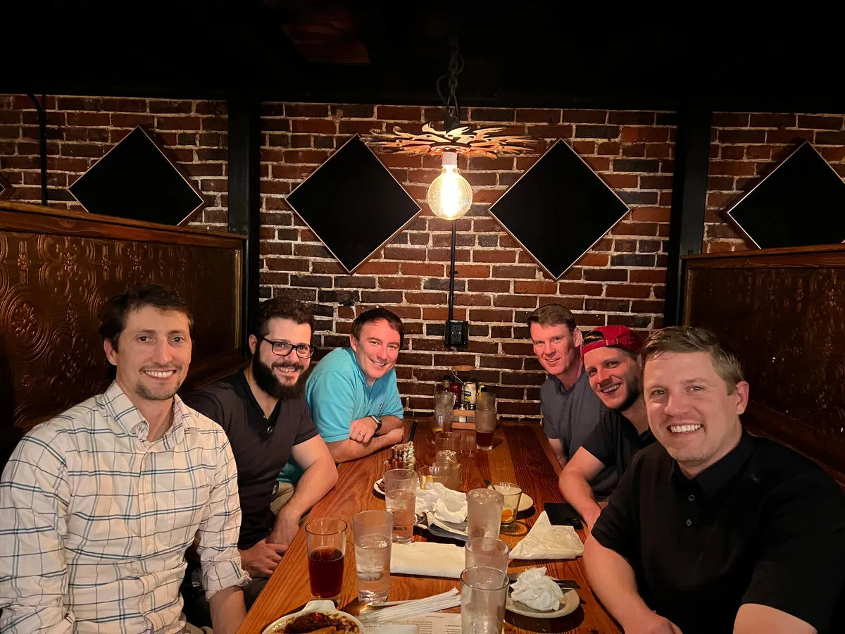 Six of us around a table at dinner